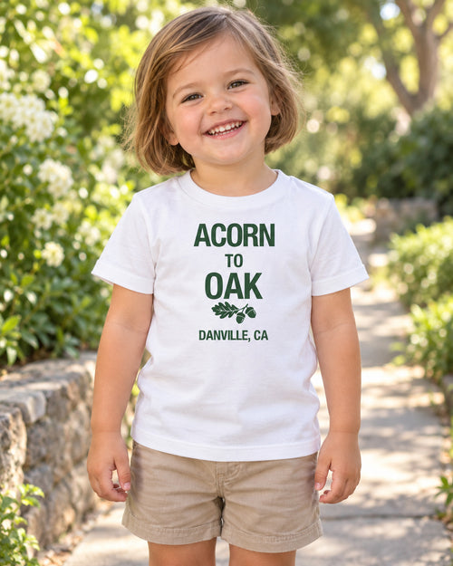 Acorn to Oak, Danville | Toddler Tee. Generated lifestyle visualization matching the saved supplier front.